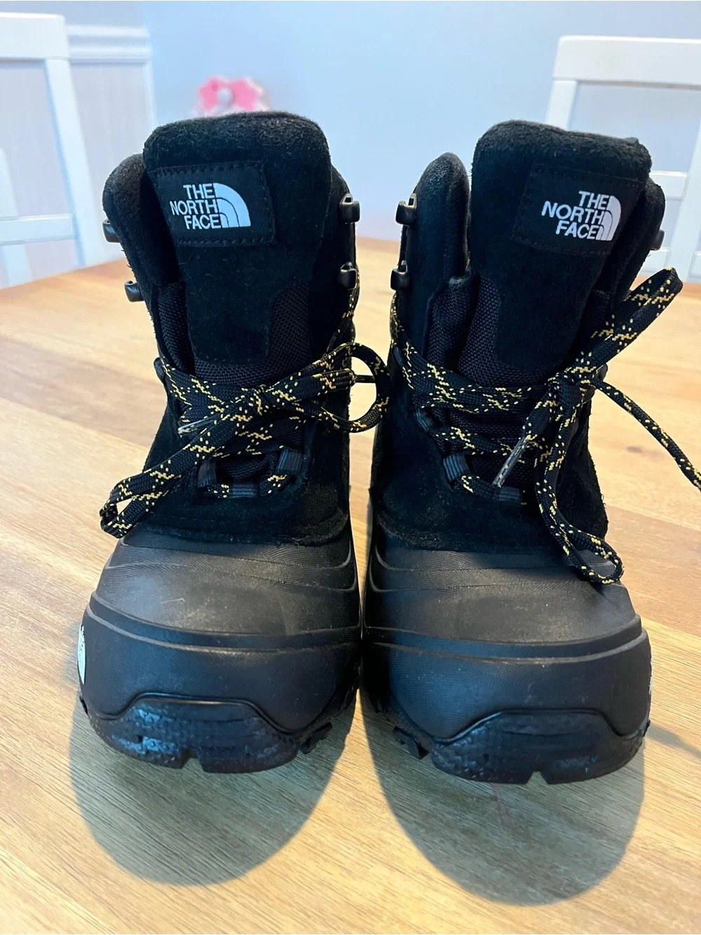 The North Face Black Boots with Yellow-Accent Laces